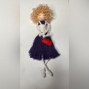 Purple Tassel Doll with Red Bag